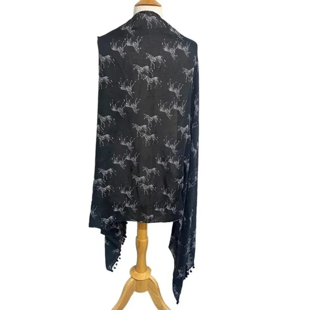 Black & white zebra print scarf with pom pom‎ trim